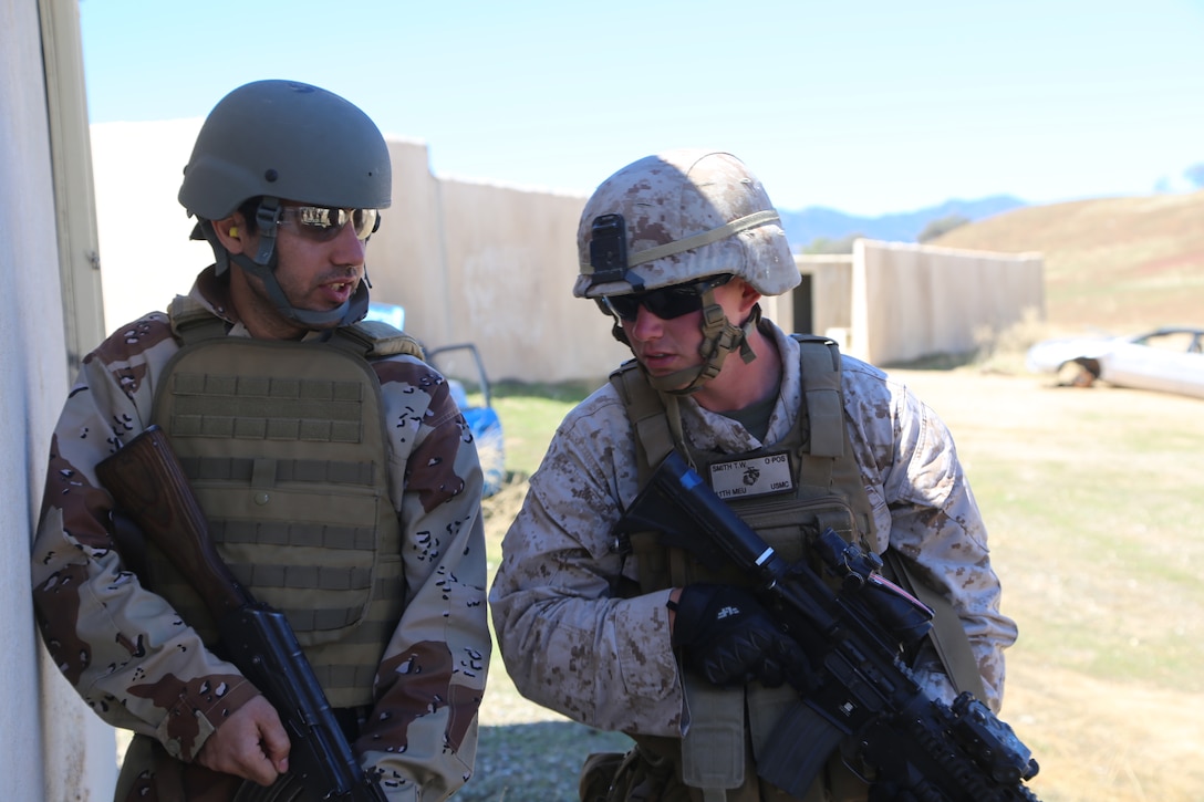 Marines with Fox Company, 2nd Battalion, 1st Marines, 11th Marine Expeditionary Unit participate in a Special Operations Training Group exercise as part of Realistic Urban Training Marine Expeditionary Unit (RUTMEUEX) 14-1 at Fort Hunter Liggett, Calif., March 18.The purpose of the course was to hone skills and tactics while training others, role-playing as a different military service, their ways of fighting. The SOTG exercise was one of the many training evolutions that took place during the RUTMEUEX in preparation for the MEU’s scheduled deployment this summer.
(Marine Corps photo by Cpl. Demetrius Morgan/RELEASED)