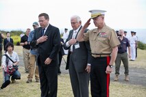Kurt Tong, left, retired Lt. Gen. Lawrence F. Snowden, center, and Gen. James F. Amos pay respect at the Reunion of Honor memorial on Iwo To, formerly known as Iwo Jima, March 19 during the annual Reunion of Honor ceremony. This year’s ceremony commemorated the 69th anniversary of the Battle of Iwo Jima. "When I founded the Joint Reunion of Honor in 1995, it was my intention that it was for that year only," said Snowden, the oldest surviving Marine of the battle. "It was such a success that we have been doing it each year since." Tong is the deputy chief of mission for the U.S. Embassy in Japan, and Amos is commandant of the Marine Corps. 
