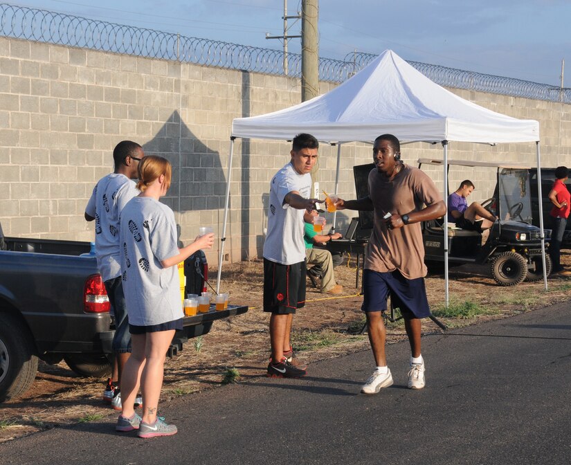 Joint Task Force-Bravo members participate in the 6.6 mile perimeter fun run/walk at Soto Cano Air Base, Honduras, March 21, 2014.  The race was organized by the Army Support Activity's (ASA) Department of Family Morale, Welfare and Recreation.  (Photo by U. S. Air National Guard Capt. Steven Stubbs)