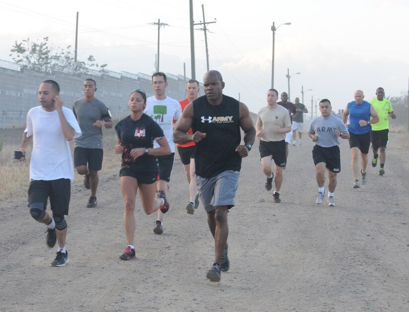 Joint Task Force-Bravo members participate in the 6.6 mile perimeter fun run/walk at Soto Cano Air Base, Honduras, March 21, 2014.  The race was organized by the Army Support Activity's (ASA) Department of Family Morale, Welfare and Recreation.  (Photo by U. S. Air National Guard Capt. Steven Stubbs)