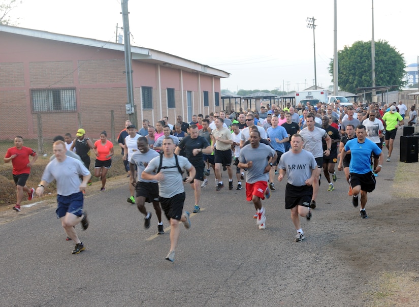 Joint Task Force-Bravo members participate in the 6.6 mile perimeter fun run/walk at Soto Cano Air Base, Honduras, March 21, 2014.  The race was organized by the Army Support Activity's (ASA) Department of Family Morale, Welfare and Recreation.  (Photo by U. S. Air National Guard Capt. Steven Stubbs)
