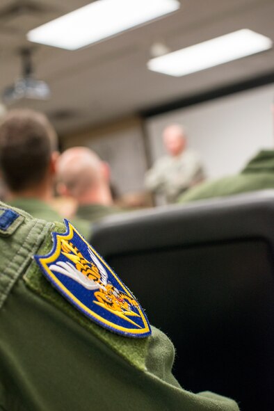 Moody A-10C Thunderbolt II pilots participate in a Q-and-A hosted by Air Force Chief of Staff Gen. Mark A. Welsh III at Moody Air Force Base, Ga., March 21, 2014.  Welsh provided insight on the reasoning behind the recent budget proposal to phase out the airframe and the way ahead for affected pilots. (U.S. Air Force photo by Airman 1st Class Ryan Callaghan/Released)