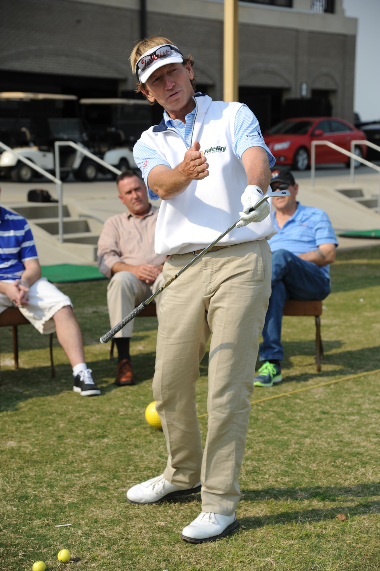 Professional Golfers’ Association champion player, Brad Faxon, provides personal golfing tips to base personnel during a free clinic March 20, 2014, at the Bay Breeze Golf Course, Keesler Air Force Base, Miss. Faxon is an eight-time PGA Tour Champion.  (U.S. Air Force photo by Kemberly Groue)