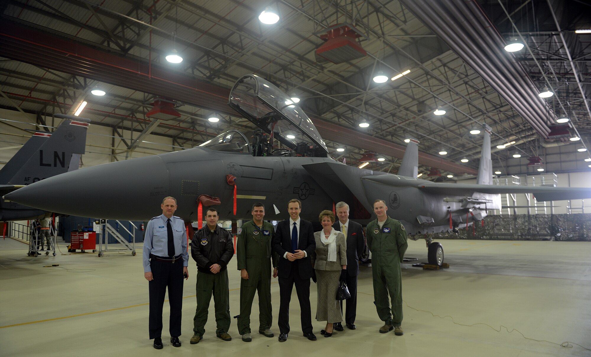 Matthew Hancock (center) poses with Liberty Wing members and honorary commanders during a tour at Royal Air Force Lakenheath, England, March 21, 2014. Inviting key members from the local community, such as Hancock, helps foster community relations and understanding of the 48th Fighter Wing’s mission, which is to provide worldwide response combat airpower and support to meet our nation’s objectives. (U.S. Air Force photos by Airman 1st Class Trevor T. McBride/Released) 