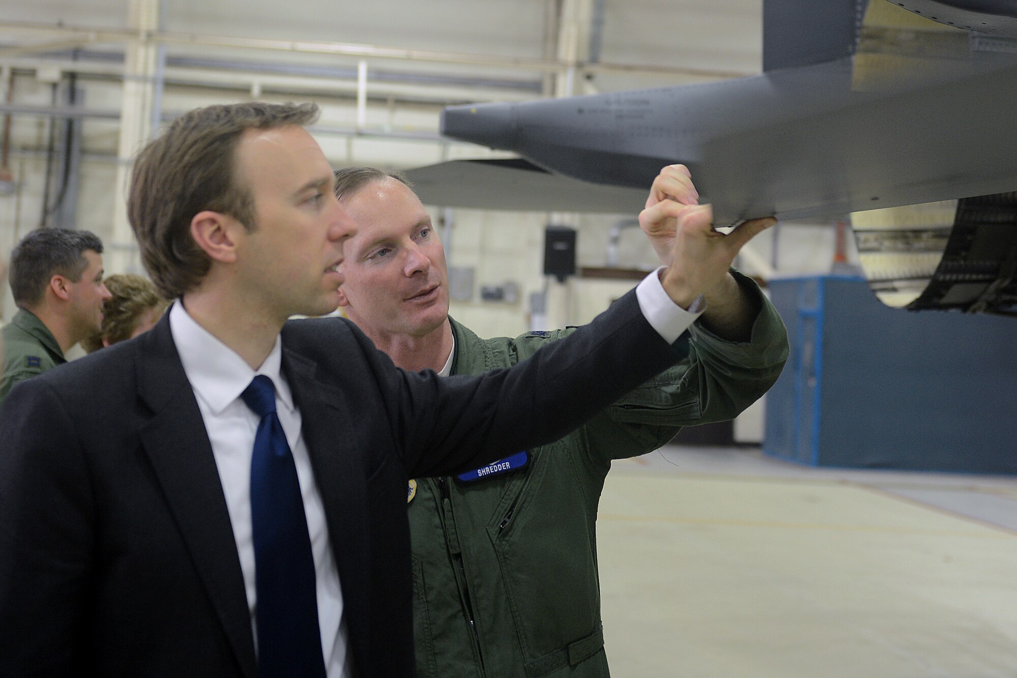 Matthew Hancock, Member of Parliament for West Suffolk, touches the tail of an F-15E Strike Eagle during a tour at Royal Air Force Lakenheath, England, March 21, 2014. Inviting key members from the local community, such as Hancock, helps foster community relations and understanding of the 48th Fighter Wing’s mission, which is to provide worldwide response combat airpower and support to meet our nation’s objectives. (U.S. Air Force photos by Airman 1st Class Trevor T. McBride/Released)  