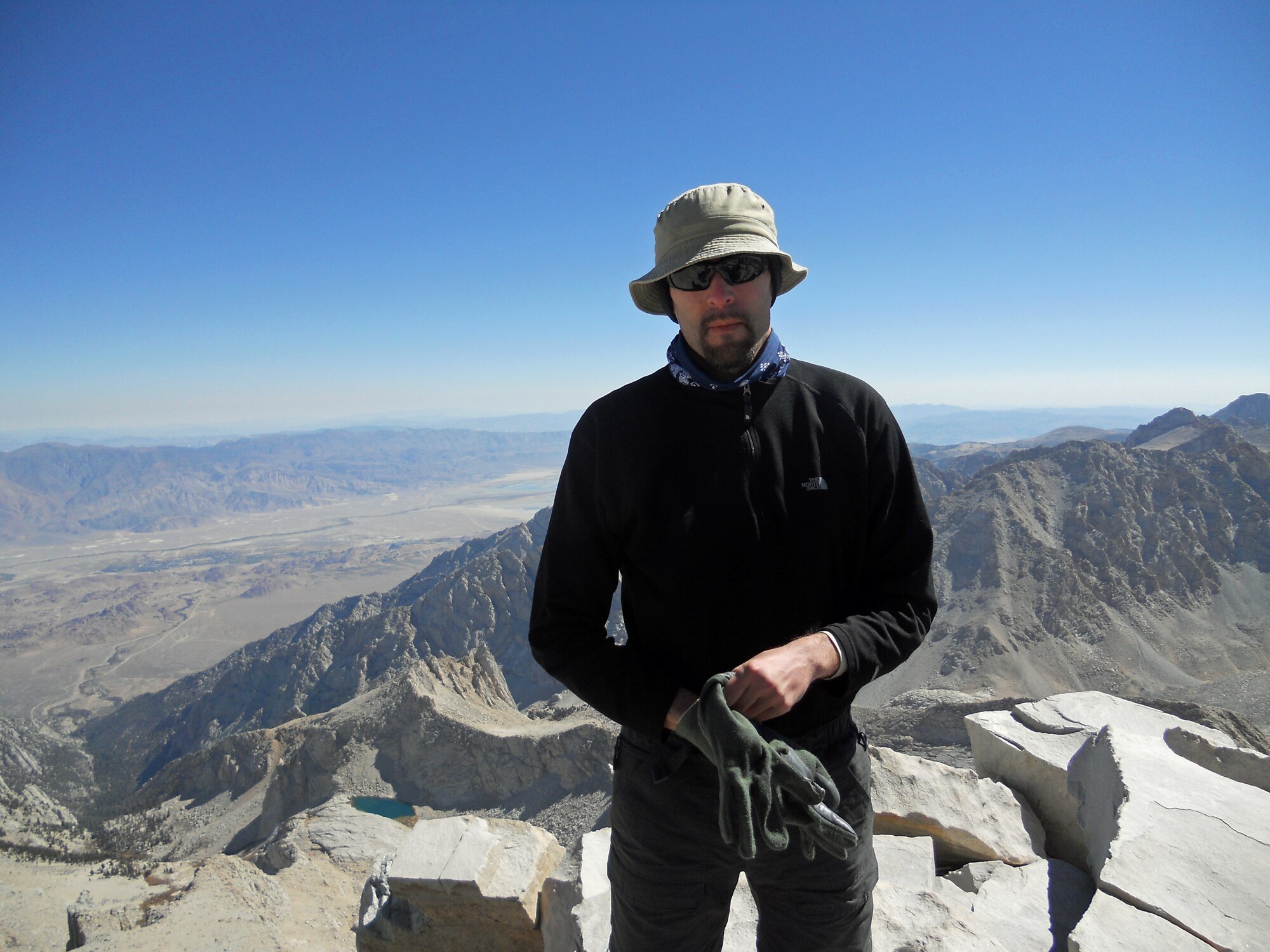 Senior Airman Keli J. Morgan stands on the summit of Mount Whitney in 2013. Morgan experienced acute mountain sickness when summitting the same peak during a 2011 trip. (courtesy photo)