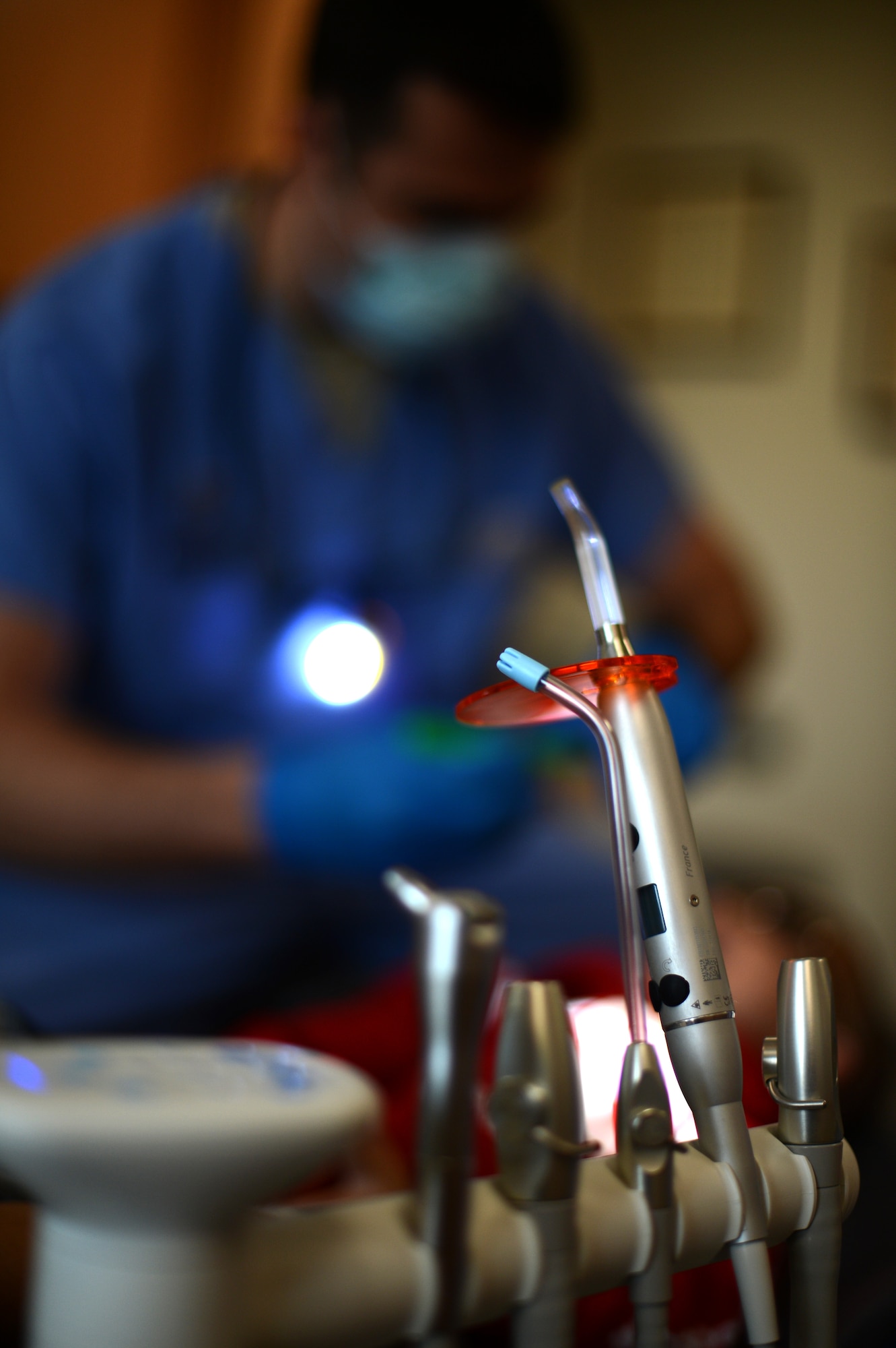 Dental equipment rests on an examination chair during a walk-in clinic for children event at Spangdahlem Air Base, Germany, March 21, 2014. The American Dental Association recommends young children should have their teeth checked within six months of first showing to ensure parents follow proper cleaning techniques. (U.S. Air Force photo by Senior Airman Gustavo Castillo/Released)
