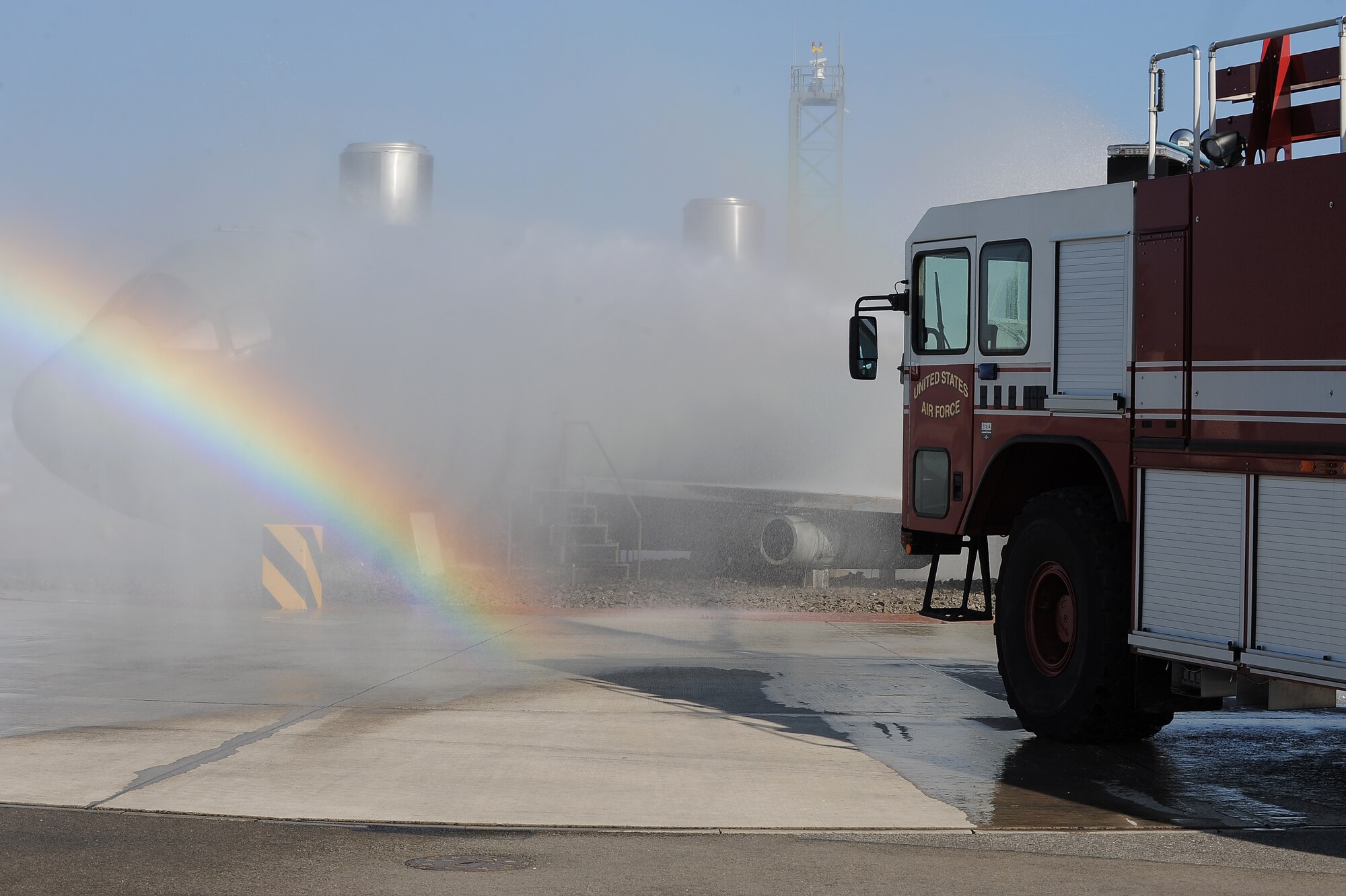 Lithuanian and Bosnian military members use a training aircraft to practice firefighting techniques during the Firefighters Fundamentals Course, March 11, 2014, at Ramstein Air Base, Germany. The course consisted of hands-on simulations and classroom portions allowing service members to learn about different fire rescue techniques. (U.S. Air Force photo/Senior Airman Hailey Haux)