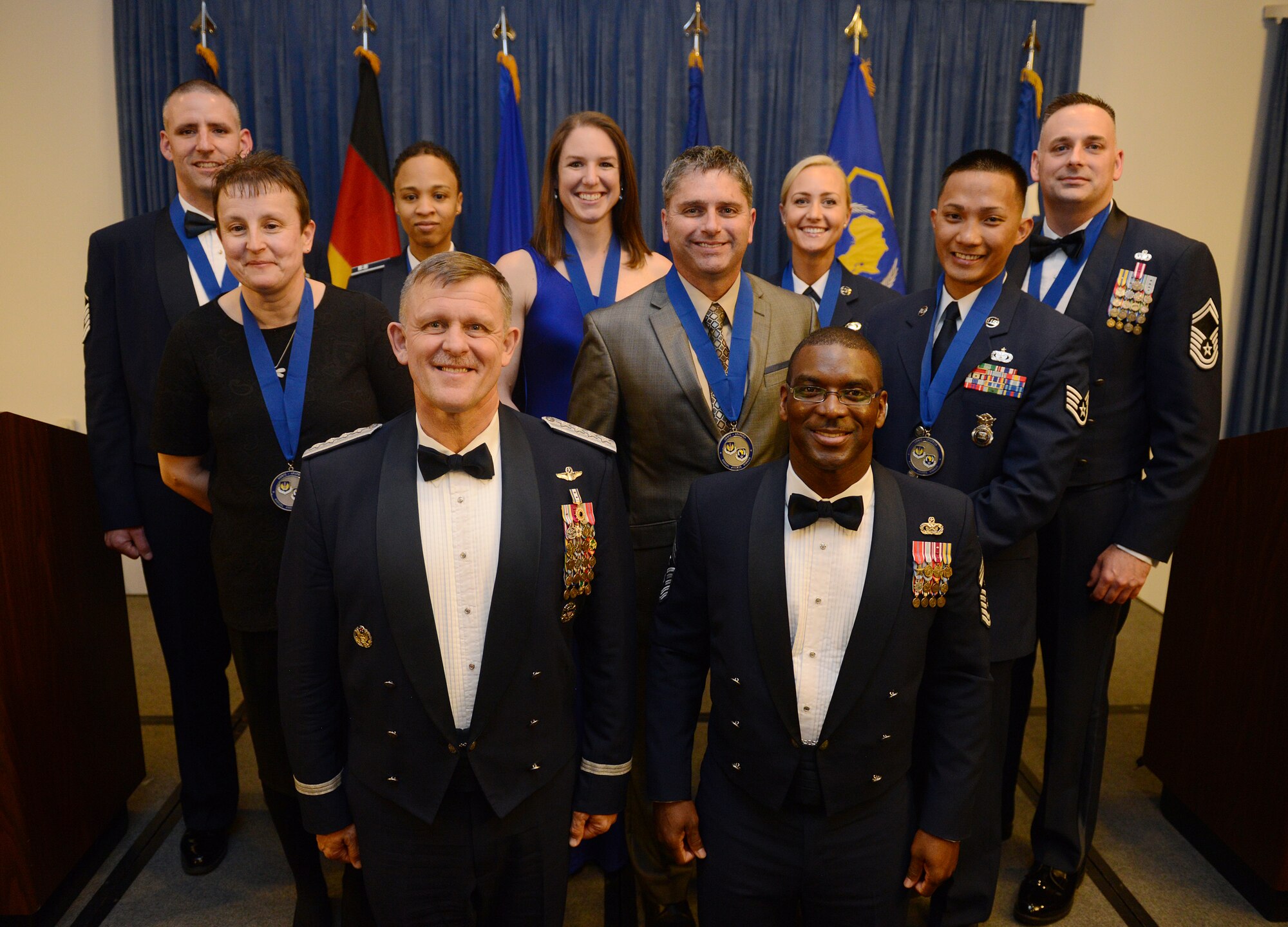 The top Airmen in U.S. Air Forces in Europe and Air Forces pose for a photo with Gen. Frank Gorenc, USAFE-AFAFRICA commander and Chief Master Sgt. James E. Davis, USAFE-AFAFRICA command chief, during an annual awards ceremony at Ramstein Air Base Germany March 20, 2014. The Airmen competed within their units, then at the wing level and have now been named the best in USAFE-AFAFRICA. They will go on to compete at the Air Force level for the coveted Outstanding Airmen of the Year award which will be announced later this year. (U.S. Air Force photo/ Staff Sgt. Ryan Crane)
