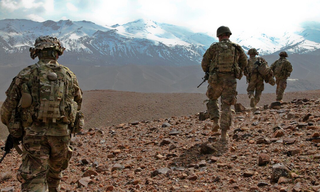 U.S. soldiers walk off the landing zone to Combat Outpost Koh-E-Safi, Afghanistan, March 12, 2014.