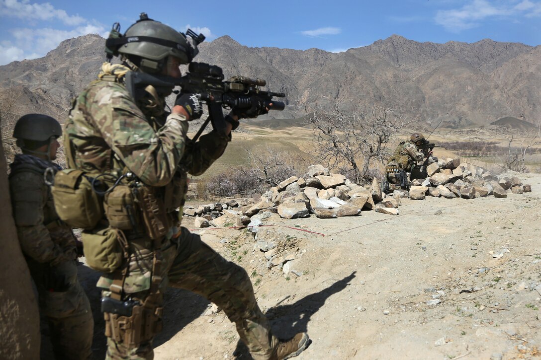 A U.S. Army Special Forces soldier provides security during a clearing operation in Denasaro Kelay village in the Mizan district of Zabul province, Afghanistan, March 8, 2014. The soldiers, assigned to Combined Joint Special Operations Task Force Afghanistan, assisted Afghan commandos with efforts to disrupt insurgent movement in the area.