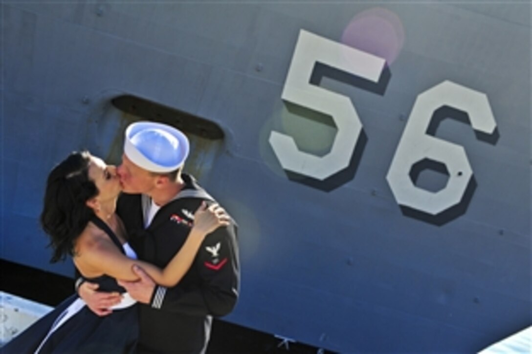 Navy Petty Officer 3rd Class Spencer Greer kisses his wife after the return of the guided-missile frigate USS Simpson to Mayport, Fla., March 20, 2014, from a six-month deployment to the U.S. 6th Fleet area of responsibility. The Simpson conducted more than 700 flight hours and traveled more than 35,000 nautical miles to support regional and maritime security. Greer is an electronics technician.
