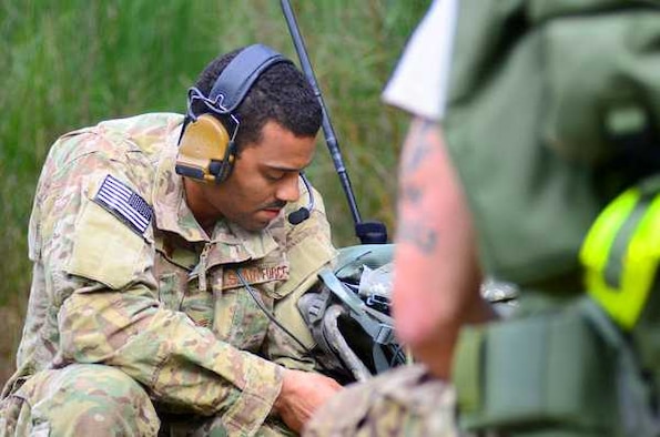 Staff Sgt. Ryan Beck communicates with simulated pilots during the 5th Air Support Operations Squadron’s recent weeklong Tactical Air Control Party competition on Joint Base Lewis-McChord, Wash. The event tested skill sets from Army and Air Force doctrine. (Northwest Guardian/Dean Siemon)