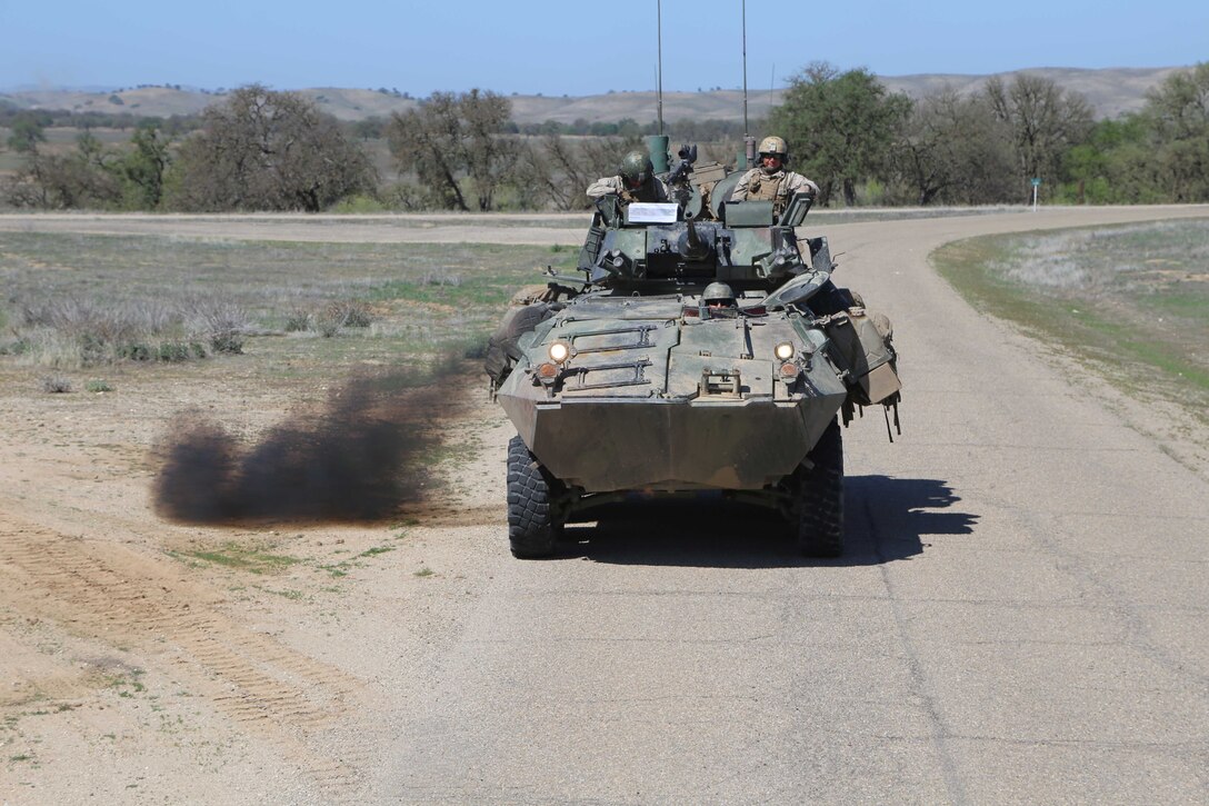 FORT HUNTER LIGGETT, Calif. - Marines with 1st Light Armored Reconnaissance, Battalion Landing Team 2nd Battalion, 1st Marines, 11th Marine Expeditionary Unit conduct a standard reconnaissance patrol using Light Armored Vehicles during Realistic Urban Training Marine Expeditionary Unit Exercise (RUTMEUEX) 14-1 at Fort Hunter Liggett, Calif., March 22. 1st LAR drove three LAVs on different types of terrain including shallow rivers, mud patches and steep hills to give the drivers more experience driving in unfavorable conditions.
(U.S. Marine Corps photo by Cpl. Demetrius Morgan/RELEASED)