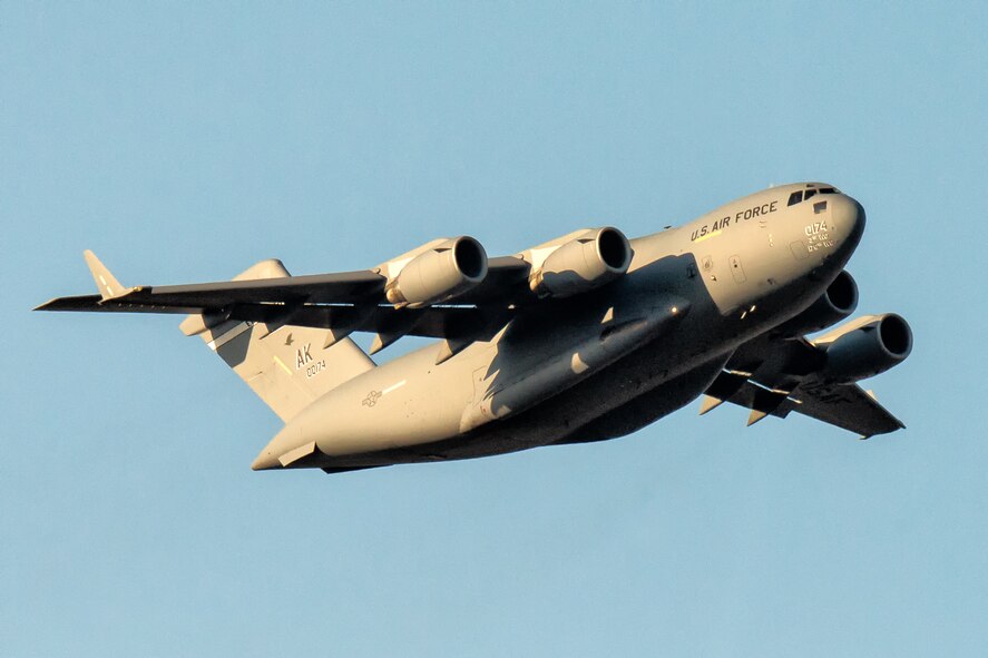 A C-17 Globemaster III from the 3rd Wing, Joint Base Elmendorf-Richardson, Alaska takes off at Yokota Air Base, Japan, March 22, 2014. The aircraft marked the first C-17 landing at the Sendai Airport after the devastating earthquake and tsunami on March 11, 2011. (U.S. Air Force photo by Osakabe Yasuo/Released)