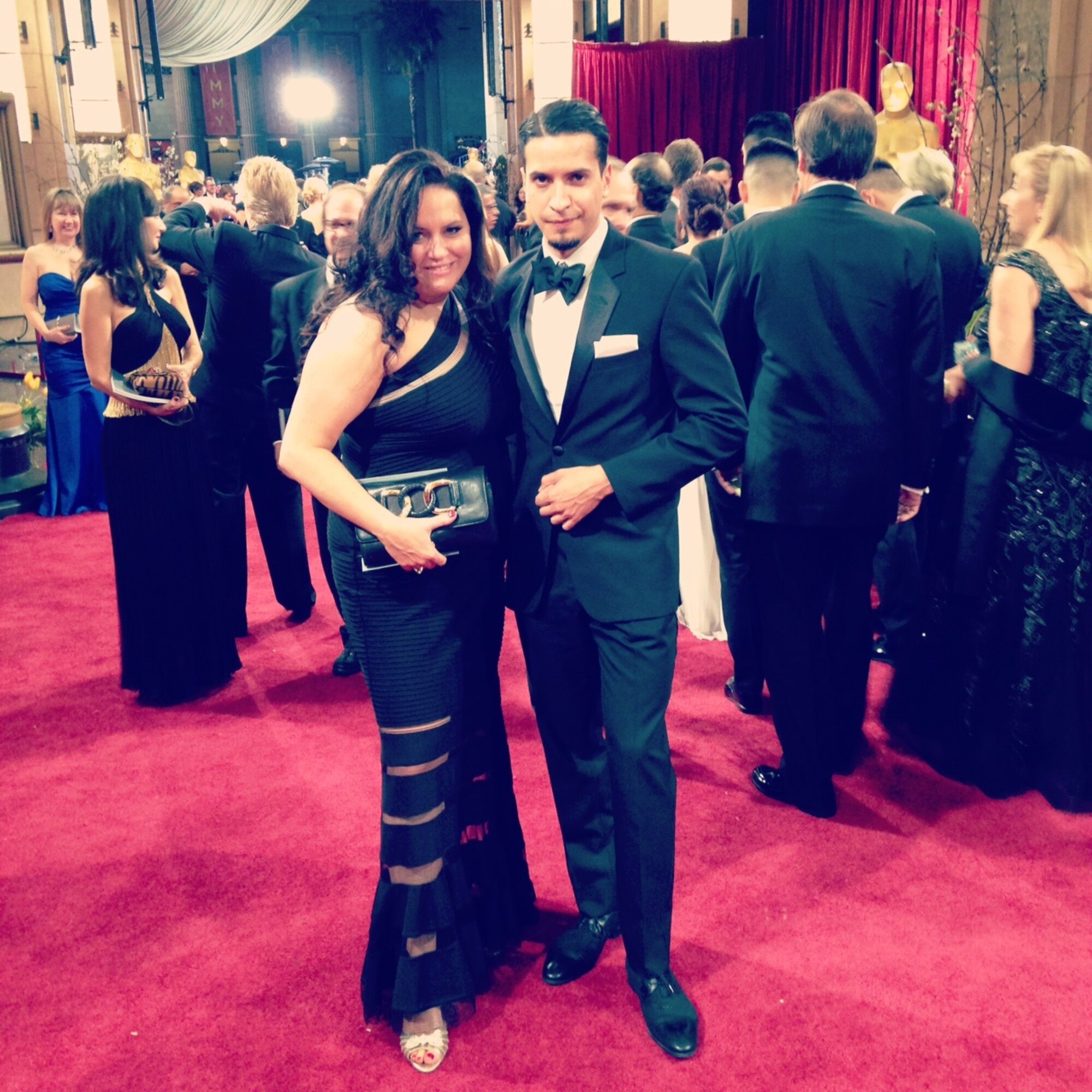Maj. Karen Hennigan of the 514th Air Mobility Wing legal office poses on the red carpet before the Academy Awards with Jesus Martinez of Disney's Pixar. (Courtesy photo/ Maj. Karen Hennigan)