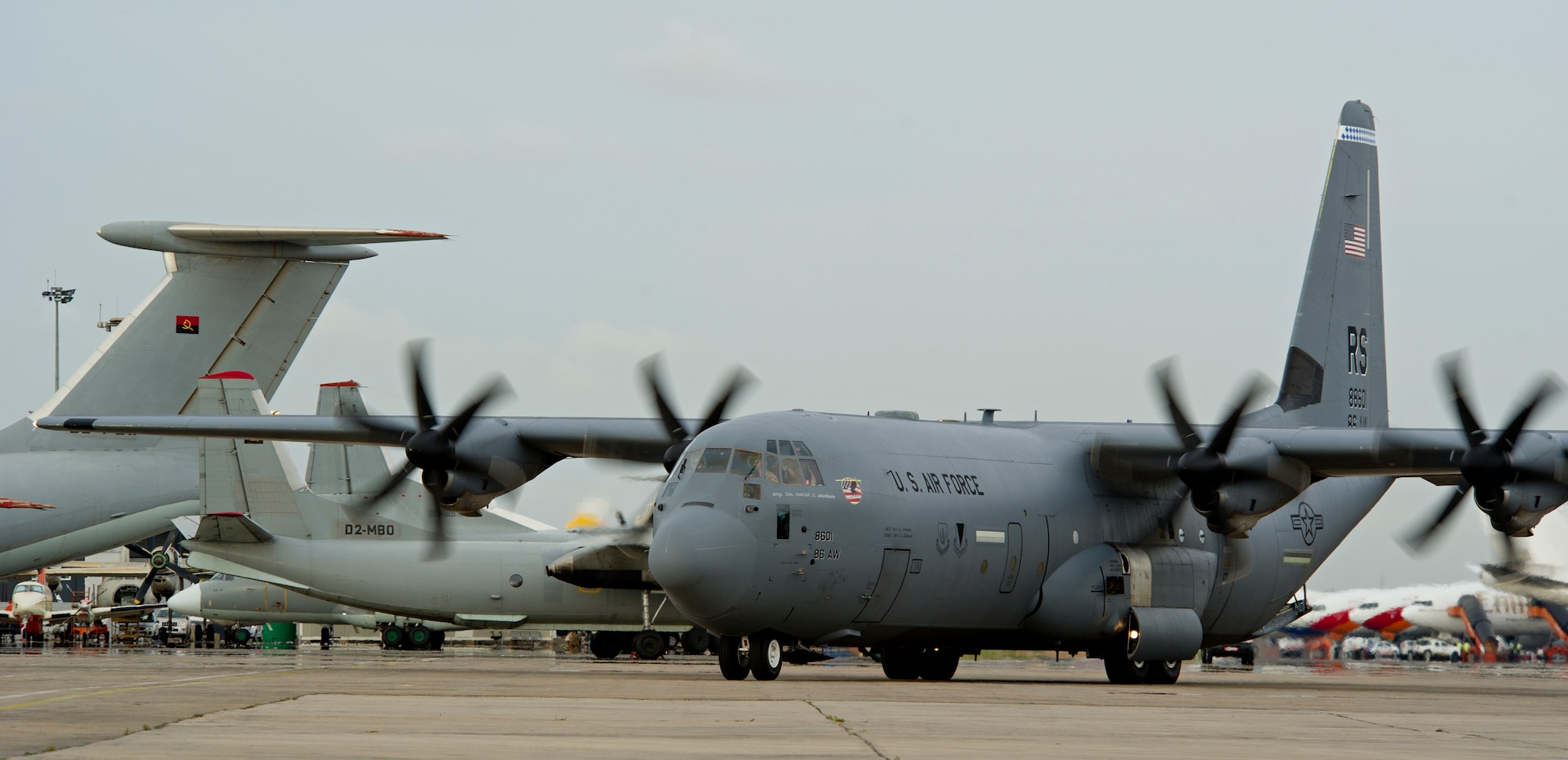 A C-130J Super Hercules from the 37th Airlift Squadron arrives at Luanda Air Base, Angola, March 22, 2014. The C-130J and about 20 U.S. Air Force airmen are in Angola to participate in African Partnership Flight with the Angolan and Zambian air forces, an event which provides a collaborative learning environment for the airmen. (U.S. Air Force photo/Tech. Sgt. Benjamin Wilson)