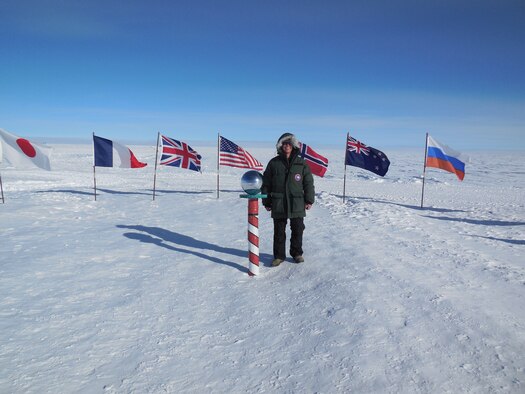 Cadet 1st Class Glen Hanson stands at the South Pole in December. The meteorology major spent a week observing climate, satellite, biological and astronomical research at McMurdo Station, Antarctica. (Courtesy photo) 


