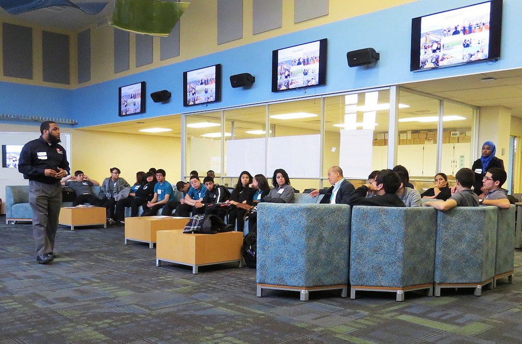 Hector Mosley, Public Affairs Specialist speaks with students at Thomas Edison Technical Academy in Elizabeth, New Jersey at a STEM education event held March 14th.  Mosley, a former pupil of the school spoke about his career path and the public affairs mission of keeping the public informed through various media on issues that may affect them