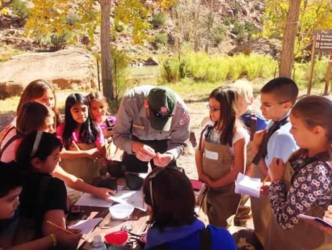 ABIQUIU LAKE, N.M.,-- The staff at the Albuquerque District’s Abiquiu Lake Project Office have partnered with the Española Wildlife Center to teach middle-school students in the area about natural resources.  There is a class every week, with every other week’s class held at the project.  The students have released a red tail hawk; done a macro-invertebrate survey; mapped the river bottom; learned about geology and watersheds, native vegetation and wildlife; and many other hands-on activities.
