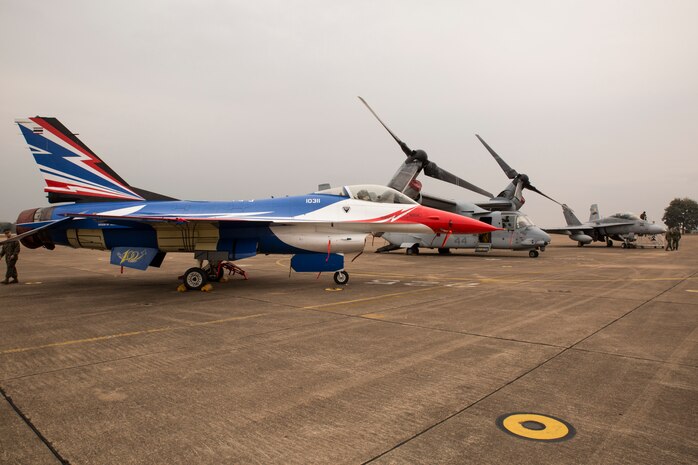 An F-16, MV-22B Osprey and FA-18D Hornet make up the static display for a community relations event aboard Wing One Royal Thai Air Force Base, Nakhon Ratchasima, Kingdom of Thailand, Feb. 20 during Exercise Cobra Gold 2014. CG 14 is a joint, multinational exercise conducted annually in the Kingdom of Thailand aimed at enhancing and increasing multinational interoperability. The F-16 is with Squadron 103, Wing One, Royal Thai Air Force. The FA-18D Hornet is with Marine All Weather Fighter Attack Squadron 242, Marine Aircraft Group 12, 1st Marine Aircraft Wing, III Marine Expeditionary Force. The MV-22B Osprey is with Marine Medium Tiltrotor Squadron 262, Marine Aircraft Group 36, 1st MAW, III MEF.