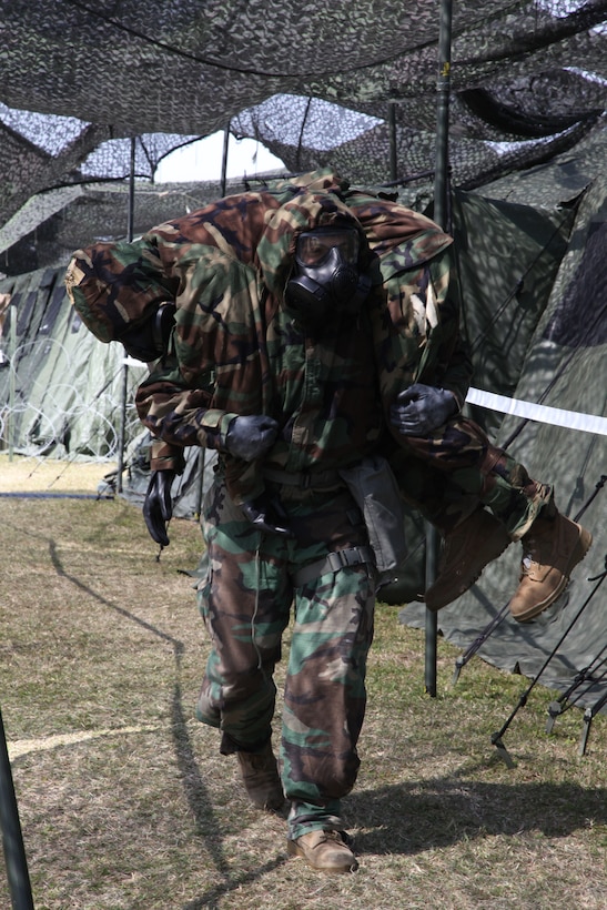 Cpl. David A. Lopez carries Lance Cpl. Dominic L. LaBeaf Feb. 25 during a gas attack drill as part of training scenario on Camp Kinser in preparation for Marine Expeditionary Force Exercise 14. During the training, Marines executed several scenarios designed to test the response time of Marines working in a combat operations center. Lopez is a data network specialist with Combat Logistics Regiment 37, 3rd Marine Logistics Group, III MEF. LaBeaf is a motor vehicle operator with 3rd MLG, III MEF.


