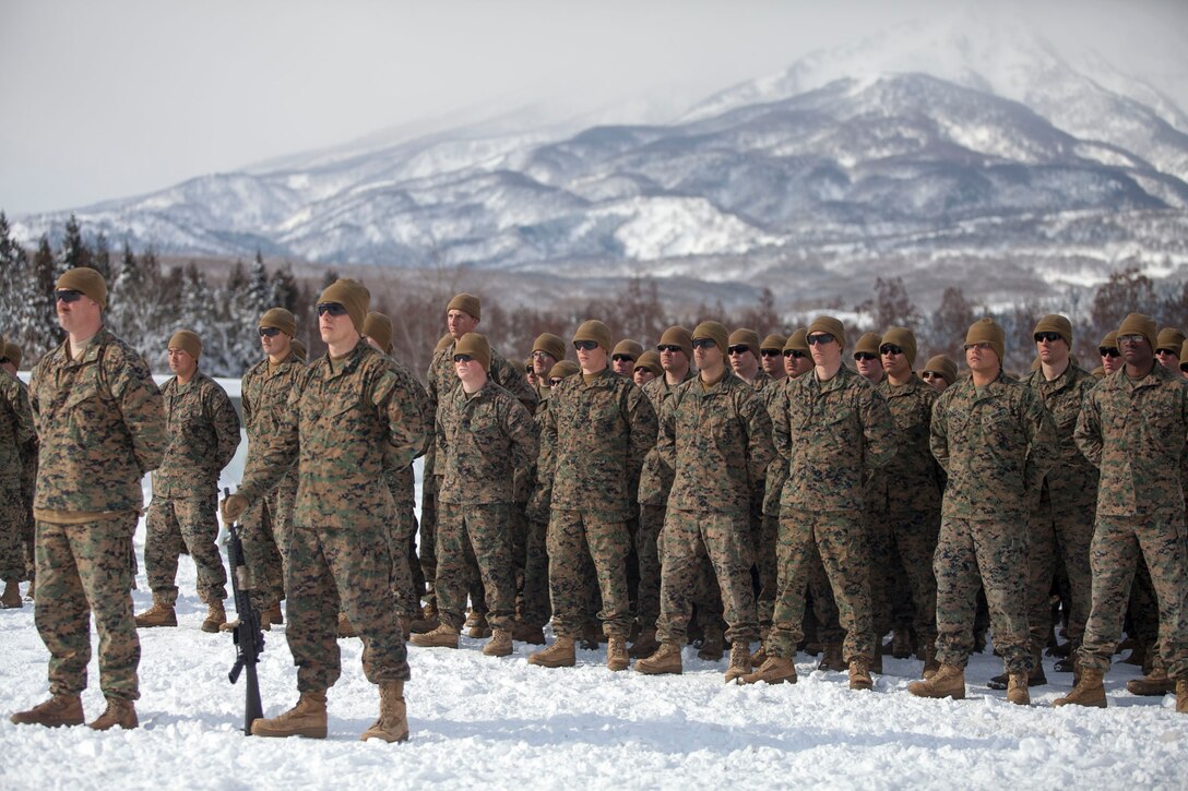 Marines with Company I, 3rd Battalion, 1st Marine Regiment, participate in the closing ceremony for Exercise Forest Light 14-2 March 8 at Sekiyama Training Area, Niigata prefecture, Japan. Forest Light was a two-week long exercise in which Marines and JGSDF members trained together, improving interoperability in cold-weather environments. Marines and JGSDF members trained in tactical movements and cold-weather survival skills in the snow. 3rd Bn., 1st Marines, is currently assigned to 4th Marines, 3rd Marine Division, III Marine Expeditionary Force, under the unit deployment program. 