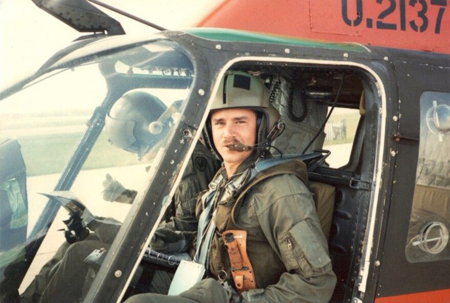 Chief Warrant Office 1 Steven Lott sits in an OH-58 scout helicopter before takeoff. Lott went to flight school from 1992 to 1993. In 1995, Lott transitioned to fixed wing aircraft. (Courtesy photo)