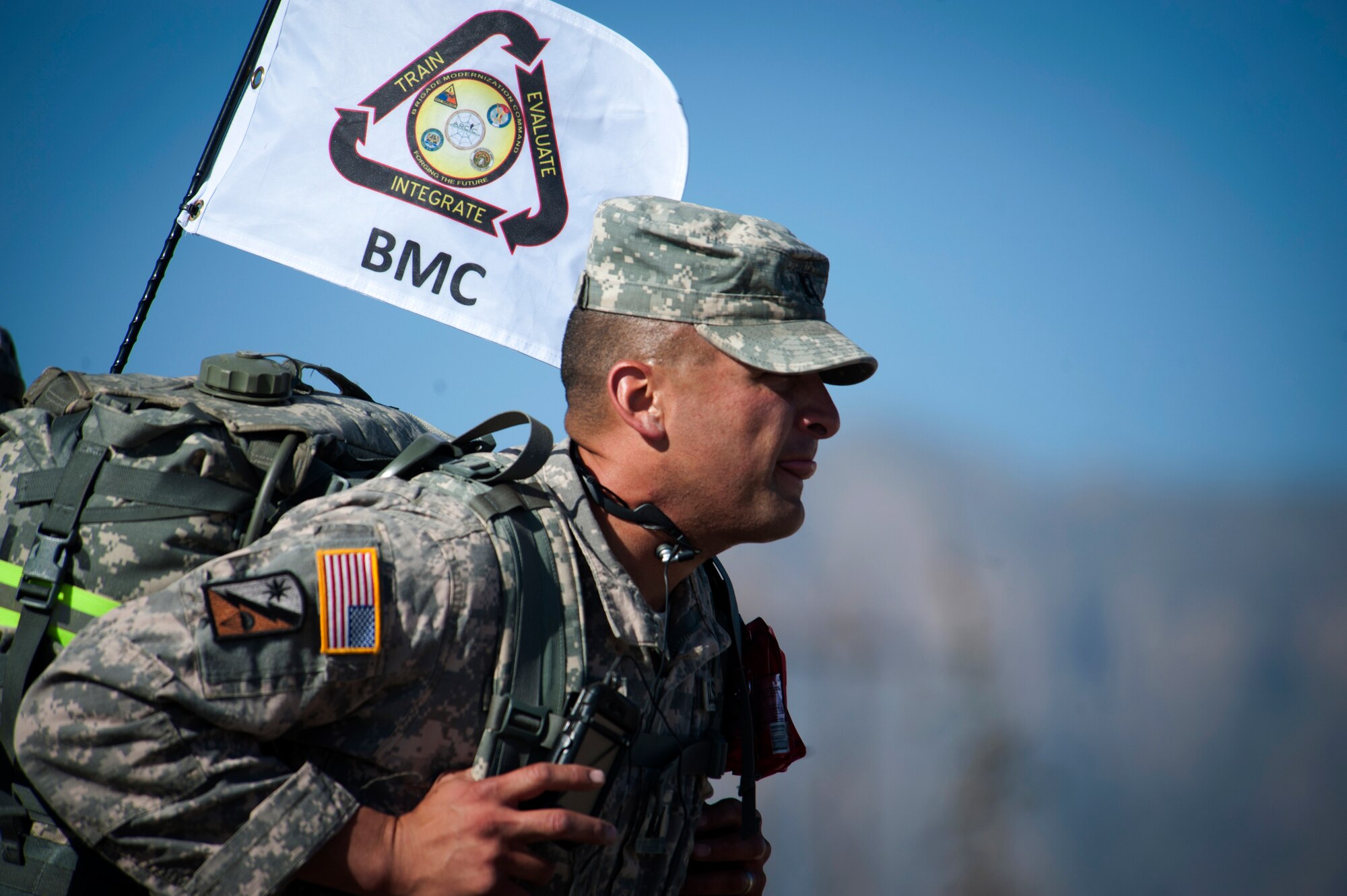A participant in the 25th annual Bataan Memorial Death march makes his way through the course at White Sands Missile Range, N.M., March 23. Over 6,200 participants came to honor more than 76,000 Prisoners of War and Missing in Action from Bataan and Corregidor during World War II. The 26.2-mile course starts on WSMR, enters hilly terrain and finishes through sandy desert trails, with elevation ranging from 4,100 to 5,300 feet. (U.S. Air Force photo by Airman 1st Class Aaron Montoya / Released)