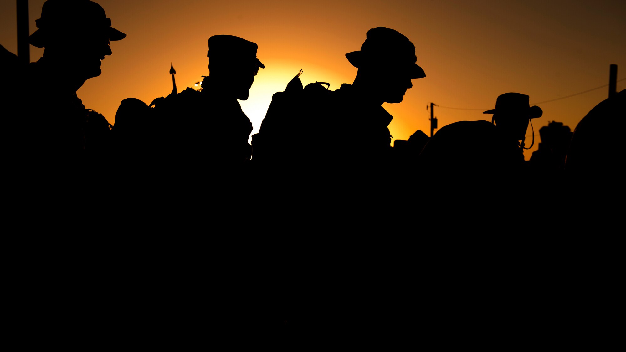 Participants in the 25th annual Bataan Memorial Death March prepare to begin their march at White Sands Missile Range, N.M., March 23. Over 6,200 participants came to honor more than 76,000 Prisoners of War and Missing in Action from Bataan and Corregidor during World War II. The 26.2-mile course starts on WSMR, enters hilly terrain and finishes through sandy desert trails, with elevation ranging from 4,100 to 5,300 feet. (U.S. Air Force photo by Airman 1st Class Aaron Montoya / Released)
