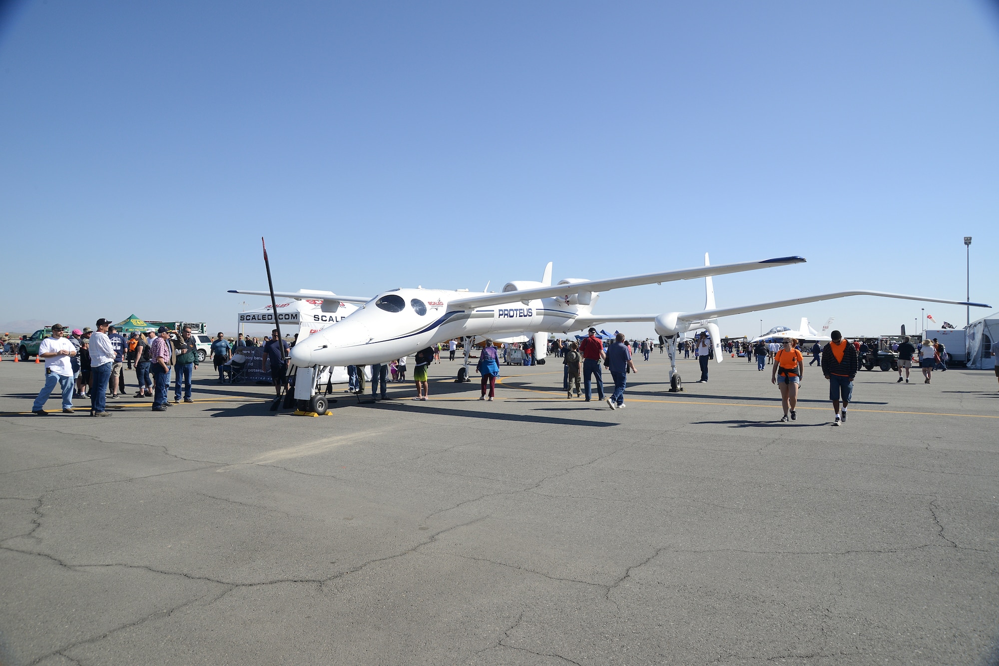 Proteus is a twin-turbofan, high-altitude, multi-mission aircraft powered by Williams International FJ44-2E engines. Proteus is owned by Northrop Grumman Corporation and operated by Scaled Composites, LLC. It is designed to carry payloads in the 2,000 lb class to altitudes above 60,000 ft and remain on station up to 14 hours. Heavier payloads can be carried for shorter missions. It is intended for both piloted and UAV missions. Missions for Proteus include telecommunications, reconnaissance, atmospheric research, commercial imaging, and space launch.The Proteus is designed with long wings and a low wing loading needed for efficient high altitude loiter. It excels in stability and low noise. (U.S. Air Force photo by Kenji Thuloweit)