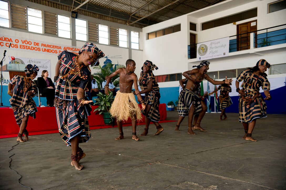 The Angolan air force dance troupe performs during the opening ceremony for African Partnership Flight Angola 2014 on Luanda Air Base, Angola, March 24, 2014. The intention of APF is to strengthen the regional partnerships within Africa by improving the proficiency and readiness of key mission areas through a collaborative learning environment. (U.S. Air Force photo/Tech. Sgt. Benjamin Wilson)(Released)