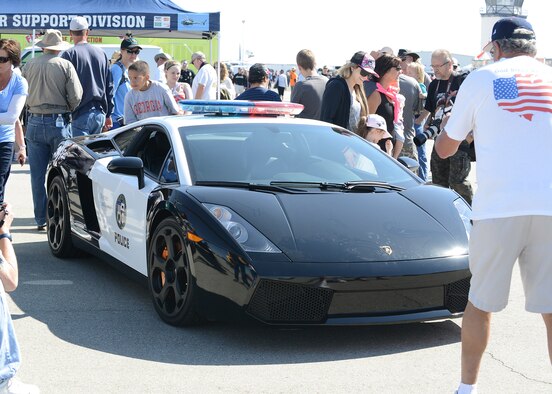 The Los Angeles Police Department displayed a promotional L.A.P.D. Ferrari patrol car. Several agencies and sponsors were on hand with booths and informational tents. (U.S. Air Force photo by Kenji Thuloweit)