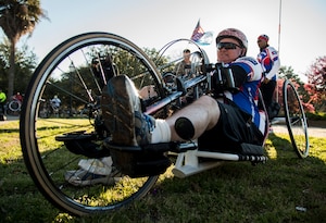 Ronald Mayfield, Warrior Ride cyclist, takes a moment to relax on his bike March 21, 2014, at the Hampton Park in North Charleston, S.C. In 1996, Mayfield received head injuries that caused severe weakness on his right side along with a speech impediment. After years of recovery, Mayfield’s speech has greatly improved and he is now one of the Warrior Ride’s strongest cyclists. The Warrior Ride is a non-profit organization that uses adaptive bicycling and other morale building events, such as kayaking and golf, as a tool for recreation and rehabilitation for our injured war heroes.  (U.S. Air Force photo/Airman 1st Class Clayton Cupit)