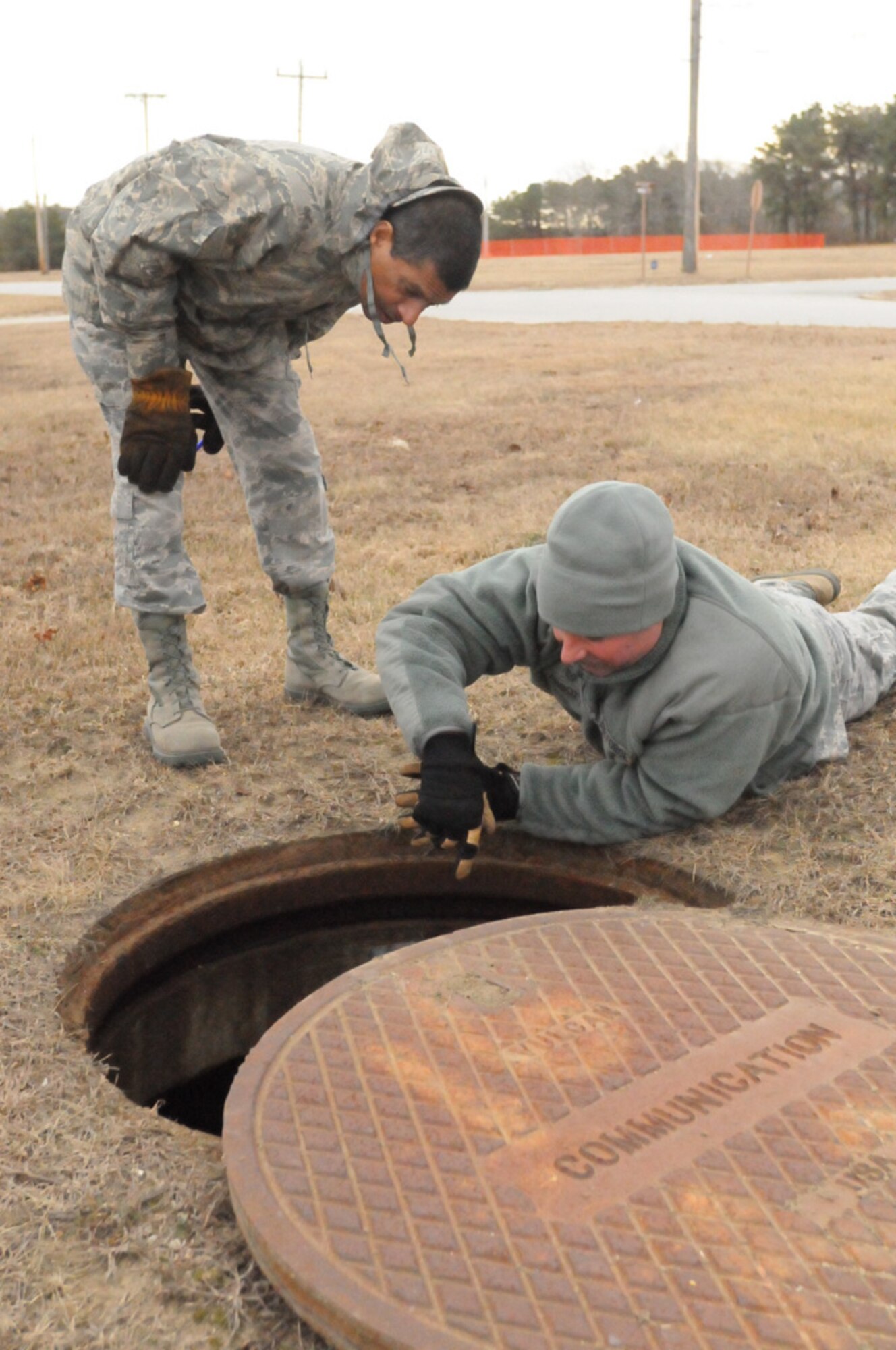 Airmen from the 253rd Combat Communications Squadron gather real-world data on the infrastructure of Otis Air National Guard Base during a GeoBase class on January 21, 2014. (National Guard photo by Master Sgt. Aaron Smith/Released)