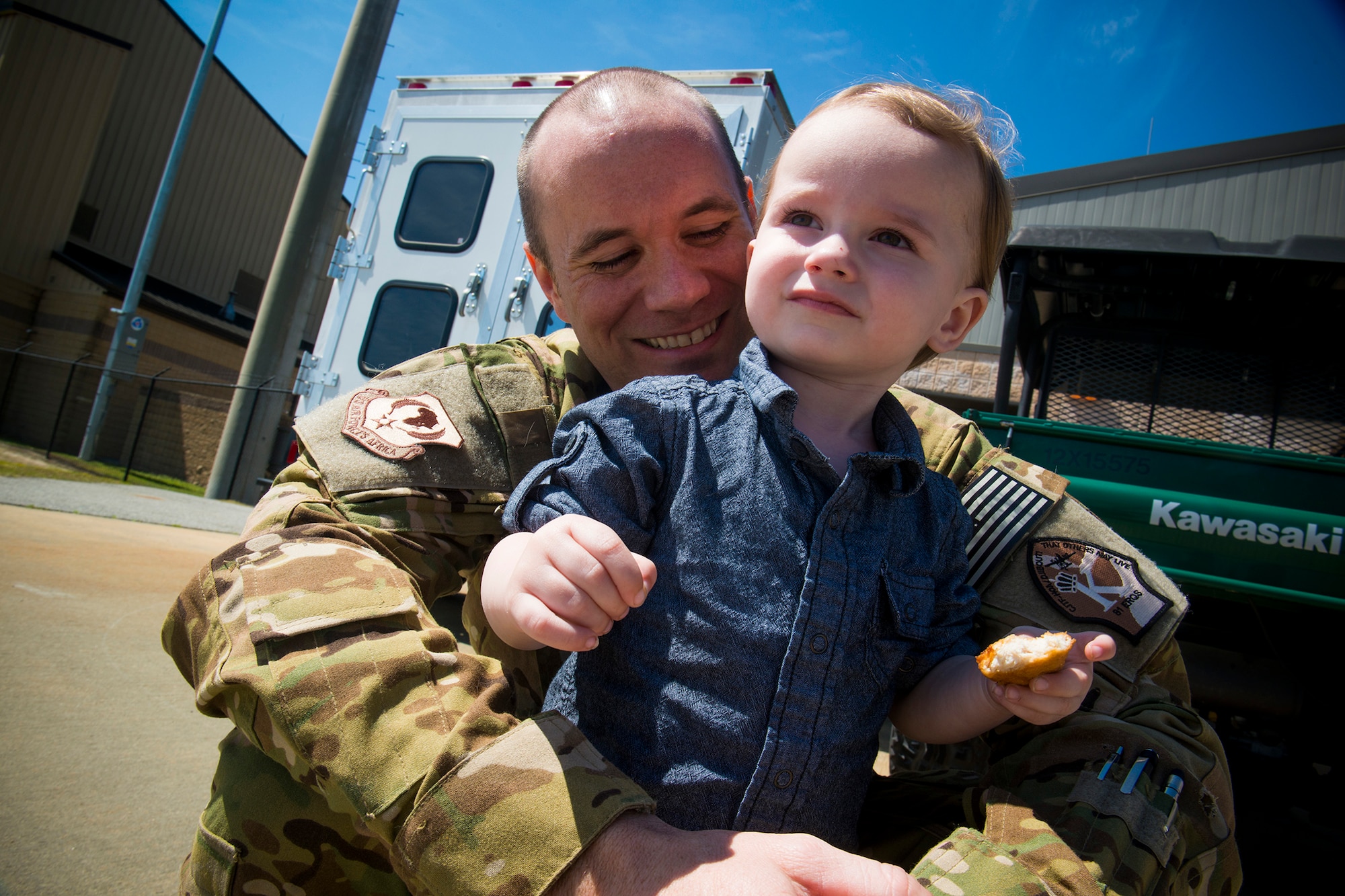 U.S. Air Force Capt. C.J. Cersovski, 71st Rescue Squadron HC-130P Combat King pilot, shares a moment with his son, Leo, before departing for deployment March 21, 2014, at Moody Air Force Base, Ga. Cersovski will support efforts in Air Forces Africa. The deployment will be Cersovski’s fifth total and second since Leo’s birth. (U.S. Air Force photo by Staff Sgt. Jamal D. Sutter/Released)