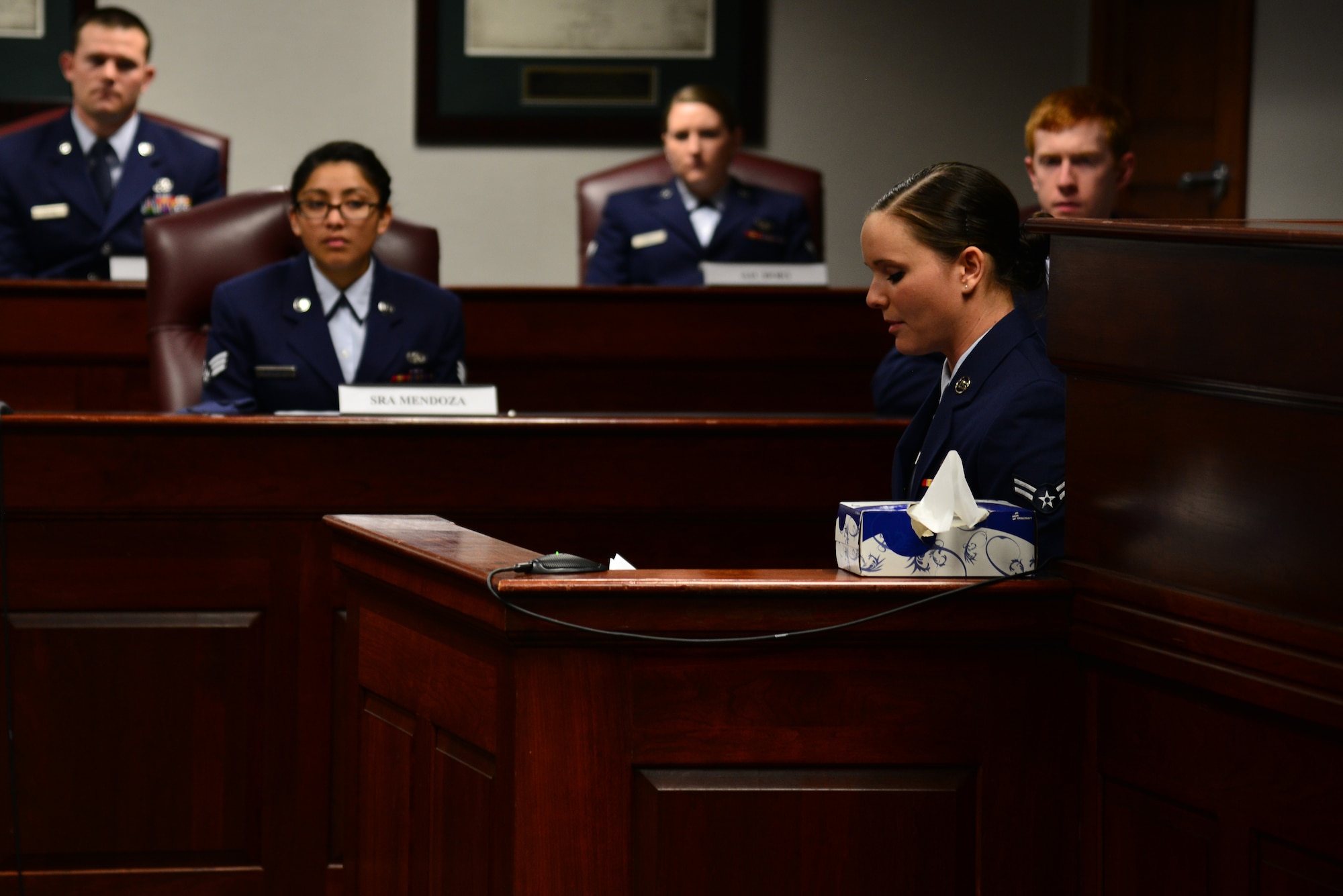 U.S. Air Force Airman 1st Class Jennifer Murphy, 633rd Force Support Squadron outbound assignments manager, testifies as a victim during a “Got Consent?” mock trial at Langley Air Force Base, Va., March 21, 2014. Airmen reenacted a court scene within a sexual assault trial that occurred at Spangdalhem Air Base, Germany, as a means of learning the consequences of such a crime. (U.S. Air Force photo by Senior Airman Aubrey White/Released)