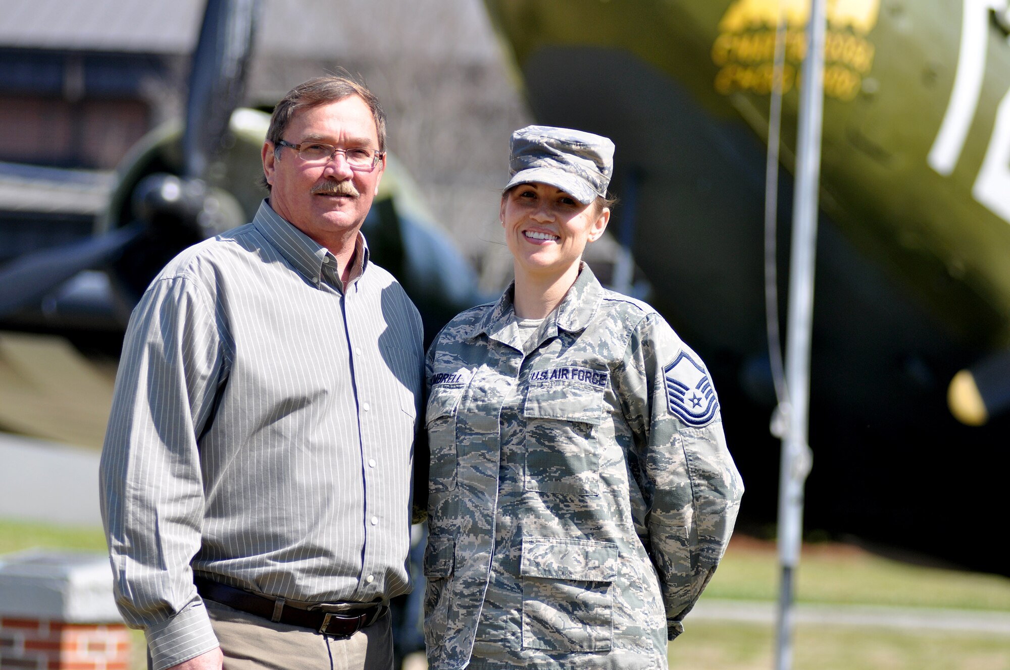 Reserve Master Sgt. Stephanie Kimbrell, logistics plans craftsman with the 315th Logistics Readiness Squadron, stands with David Harvill, public health specialist  628th Medical Group pose for a photo at Joint Base Charleston S.C.  They were complete strangers a few months ago, but now they consider each other family after Kimbrell donated one of her kidneys to Harvill who had stage 5 kidney disease. They both said they want others tobe inspired by their story and consider donating an organ to save somebody's life -- whether they are family, friends or a stranger.  (U.S. Air Force Reserve photo by Michael Dukes)