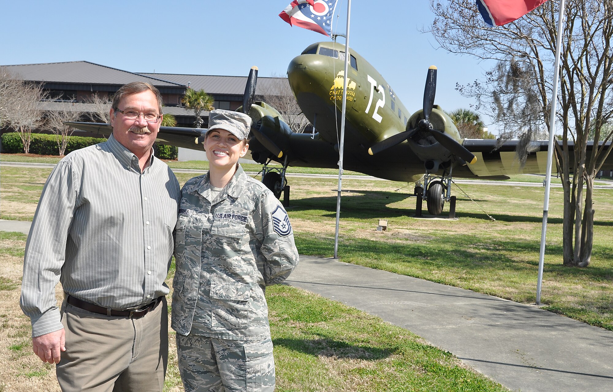 Reserve Master Sgt. Stephanie Kimbrell, logistics plans craftsman with the 315th Logistics Readiness Squadron, stands with David Harvill, public health specialist  628th Medical Group pose for a photo at Joint Base Charleston S.C.  They were complete strangers a few months ago, but now they consider each other family after Kimbrell donated one of her kidneys to Harvill who had stage 5 kidney disease. They both said they want others tobe inspired by their story and consider donating an organ to save somebody's life -- whether they are family, friends or a stranger.  (U.S. Air Force Reserve photo by Michael Dukes)