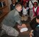 Airman 1st Class Brian Pagel, 375th Aeromedical Squadron Medical technician, instructs Lift for Life Academy sixth-grade students on the proper methods of administering CPR, Feb. 26, 2014, at the school’s health fair. Service members from Scott Air Force Base, Ill., manned information stations, talked about fitness, discussed resiliency and demonstrated Self Aid Buddy Care techniques to the students. (Courtesy photo/Katelyn Hippen-Smith)