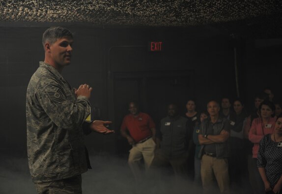 U.S. Air Force Tech. Sgt. Cory Hebb, 820th Combat Operations Squadron NCO in charge of innovative combat equipment, briefs members of Leadership Georgia at Moody Air Force Base, Ga., March 21, 2014. Members of Leadership Georgia were able to participate in engagement skills training to get a complete understanding of what members do while deployed. (U.S. Air Force Senior Airman Olivia Bumpers/Released)  