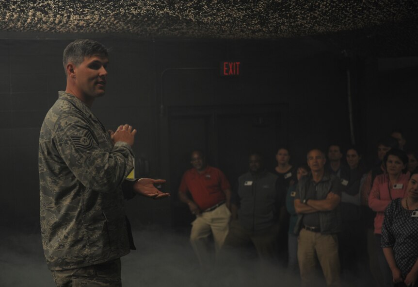 U.S. Air Force Tech. Sgt. Cory Hebb, 820th Combat Operations Squadron NCO in charge of innovative combat equipment, briefs members of Leadership Georgia at Moody Air Force Base, Ga., March 21, 2014. Members of Leadership Georgia were able to participate in engagement skills training to get a complete understanding of what members do while deployed. (U.S. Air Force Senior Airman Olivia Bumpers/Released)  