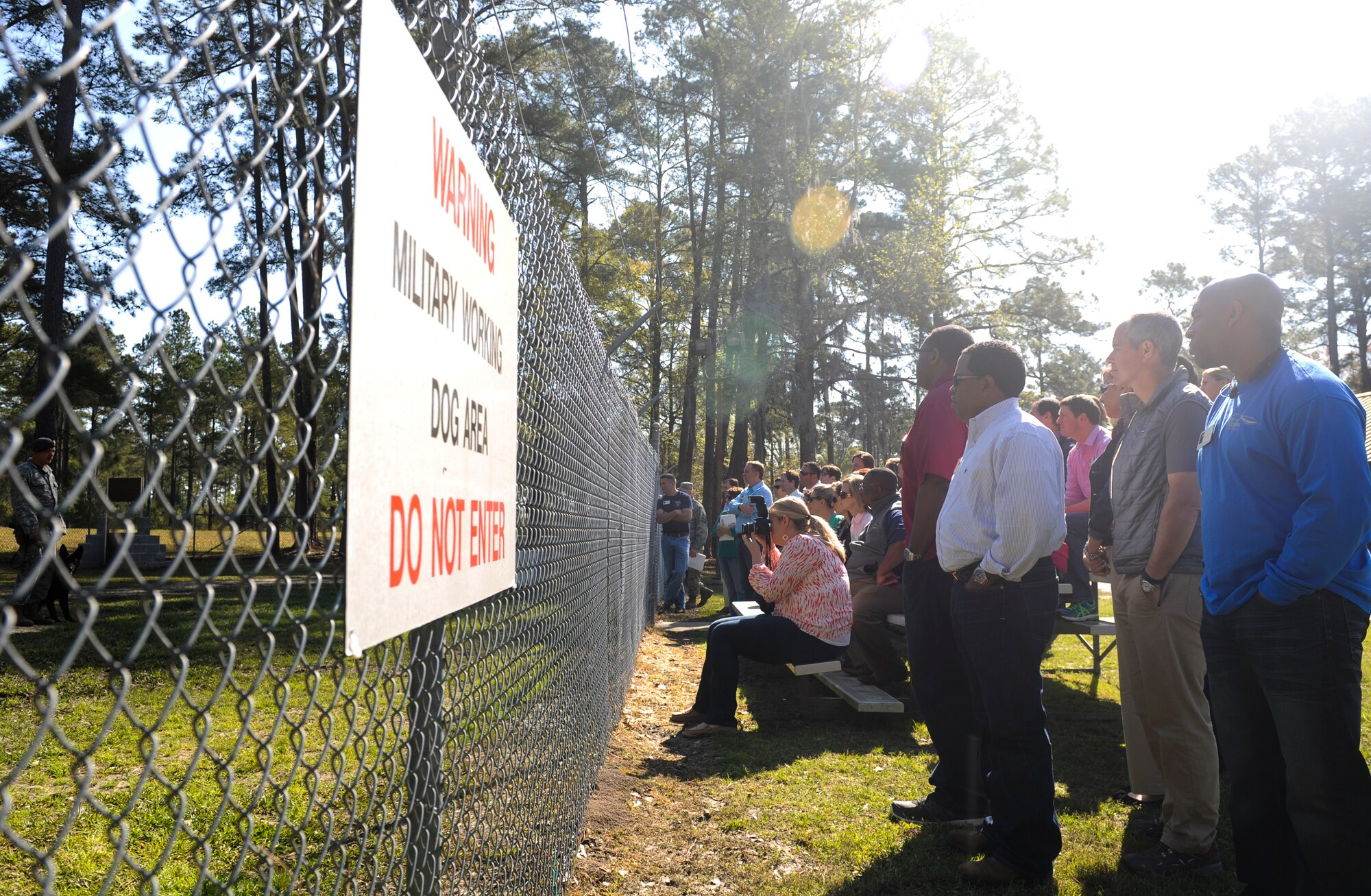 Members of Leadership Georgia watch a demonstration by 23d Security Forces Squadron military working dogs at Moody Air Force Base, Ga., March 21, 2014. Leadership Georgia is a statewide leadership development program hosted by the Georgia Chamber of Commerce. (U.S. Air Force photo by Senior Airman Olivia Bumpers/Released)