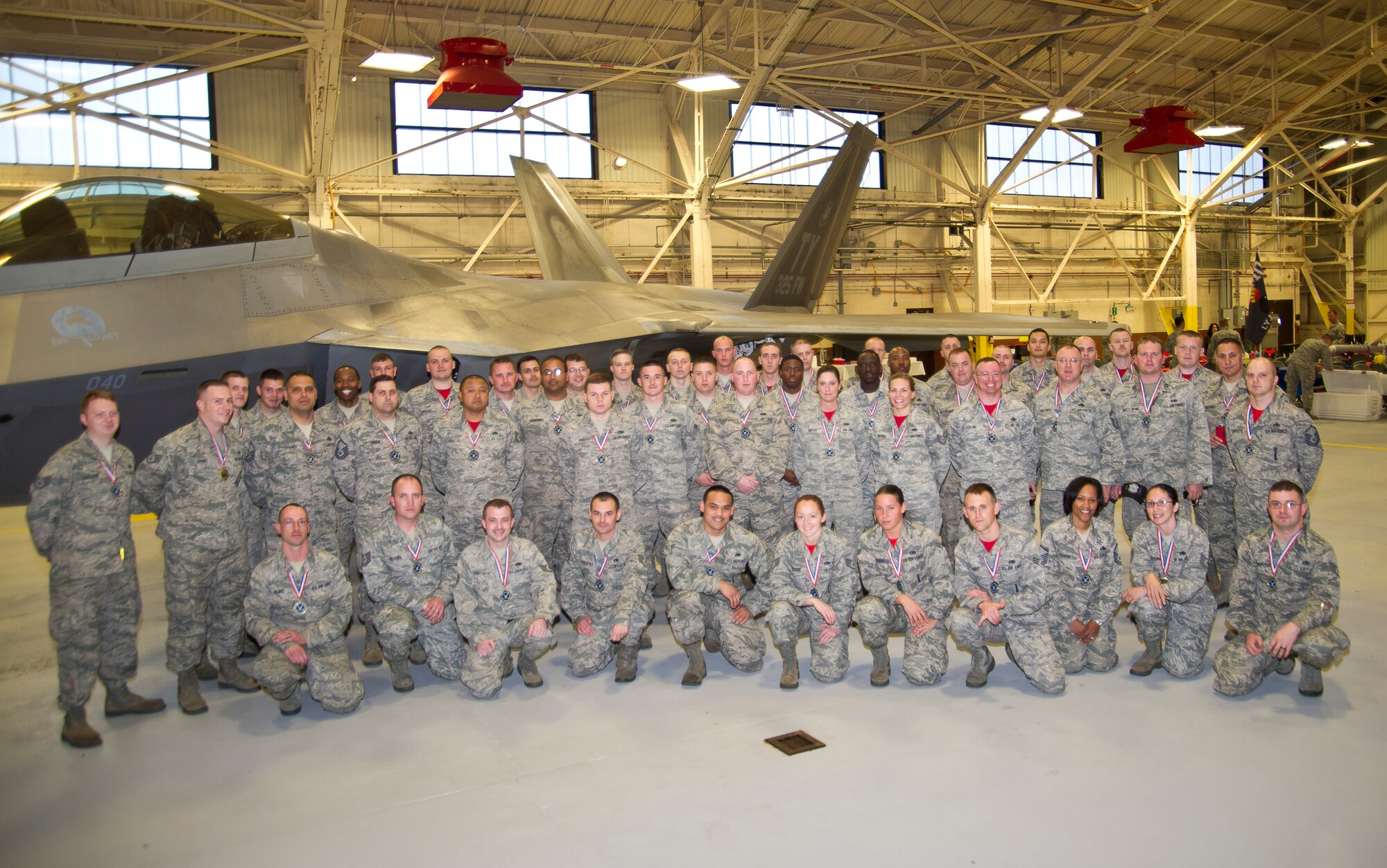 Airmen nominated for Military Professional of the Year pose for a group picture March 7 at Hanger 2. The Airmen are from the 325th Maintenance Group and were at the annual MPOY banquet. (U.S. Air force photo by Airman 1st Class Dustin Mullen) 