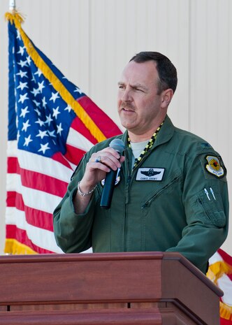 U.S. Air Force Col. Christopher Short, 57th Wing commander, speaks in front of the new F-35 Lightning Aircraft Maintenance Unit hangar, March 18, 2014, at Nellis Air Force Base, Nev. The new Lightning AMU hangar is a $20.6 million project that will be home to 24 future F-35 Lightning IIs and supporting more than 150 air and ground crew members. (U.S. Air Force photo by Airman 1st Class Thomas Spangler) 