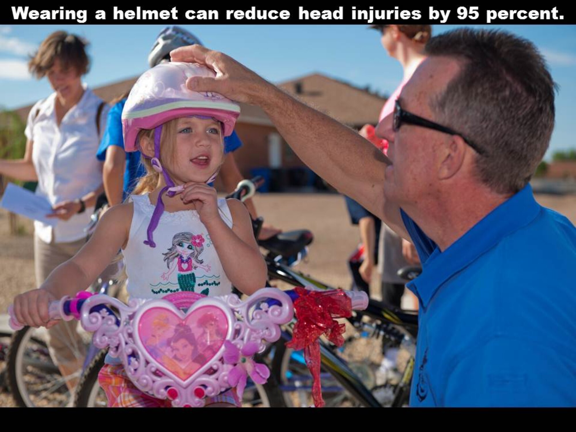 Wearing a helmet, along with other protective equipment, while riding a bike saves lives. 