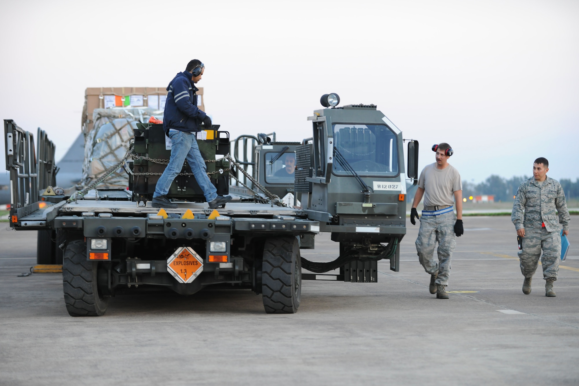 Turkish employees from the 728th Air Mobility Squadron and U.S. Airmen stationed at Incirlik Air Base secure a Patriot missile onto a truck before it is moved onto an aircraft, March 20, 2014, Incirlik Air Base, Turkey.  Airmen from the 39th Logistics Readiness Squadron and U.S. Army 5-7 Air Defense Battalion soldiers handled the paperwork, transportation and customs for the shipment while aircraft coordination was worked by the 728th AMS. (U.S. Air Force photo by Senior Airman Nicole Sikorski/Released)