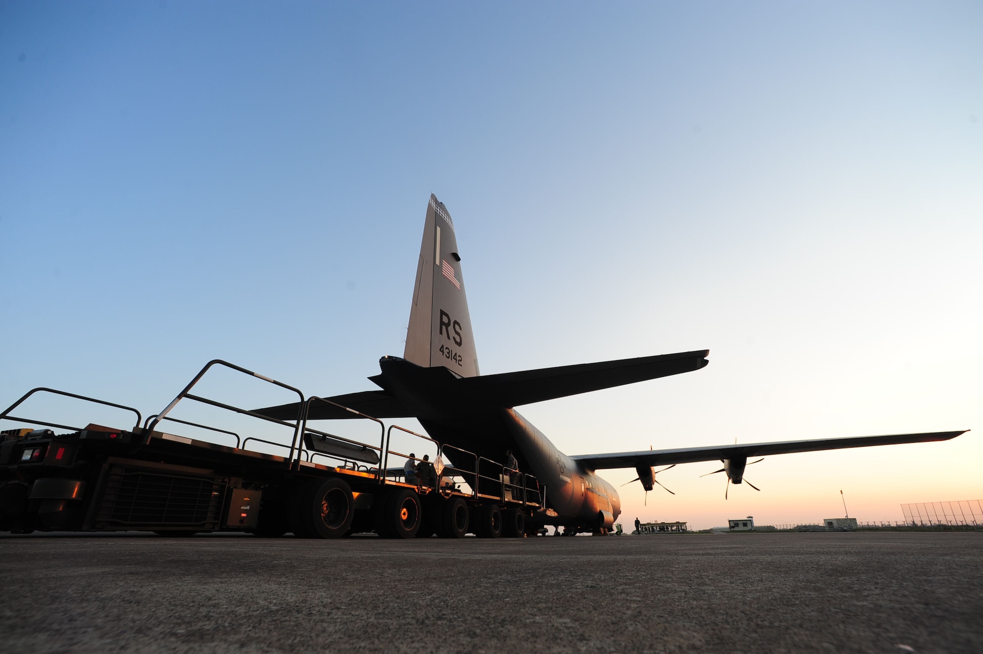 Airmen assigned to the 728th Air Mobility Squadron unload a Patriot missile from a C-130J Super Hercules March 20, 2014, Incirlik Air Base, Turkey. Personnel from the 39th Maintenance Squadron munitions secured the Patriot missile after it was downloaded from the aircraft. (U.S. Air Force photo by Senior Airman Nicole Sikorski/Released)