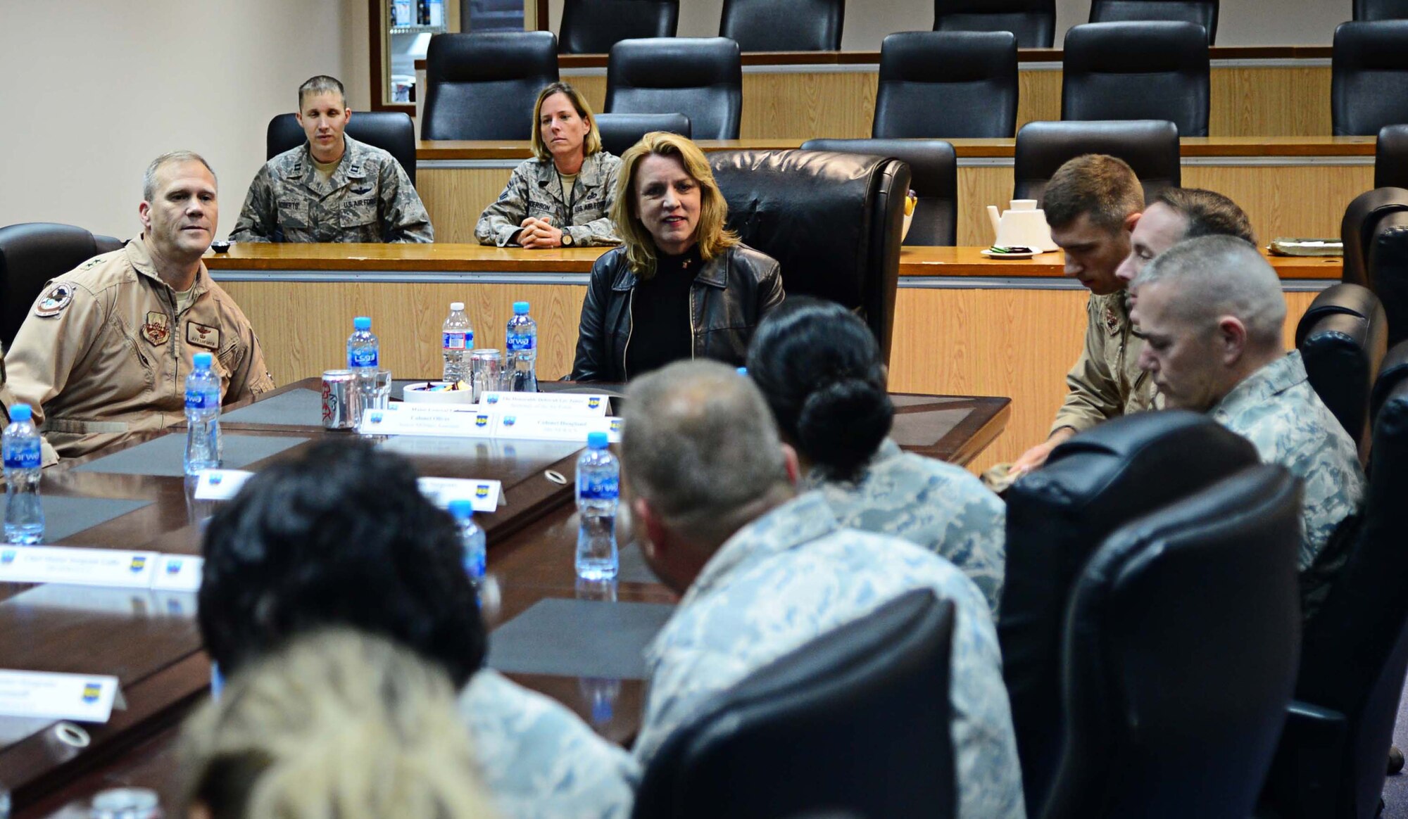 386th Air Expeditionary Wing group commanders introduce themselves to Secretary of the Air Force Deborah Lee James before a mission brief presentation at an undisclosed location in Southwest Asia. As James’ base tour ended and her Air Forces Central Command’s area of responsibility orientation closed, she said the lessons learned and the takeaways from the past week will help her continue to fight for the 690,000 Airmen under her purview. (U.S. Air Force photo by Senior Airman Desiree W. Moye)