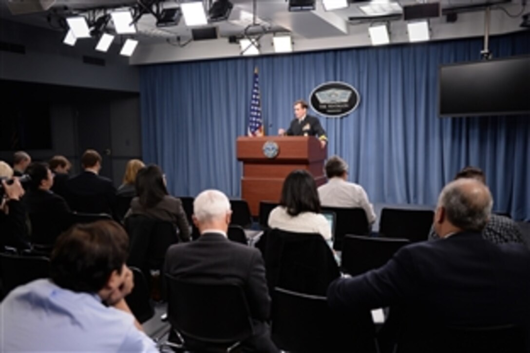 Pentagon Press Secretary Nay Rear Adm. John Kirby conducts a news briefing with reporters at the Pentagon, March 24, 2014. Kirby said Defense Secretary Chuck Hagel issued a video message emphasizing professionalism in the Defense Department, and was meeting with senior service leaders on ways to maintain ethics and character across the force.
